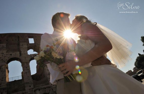 francesca and sheldon during their wedding at colosseum in rome